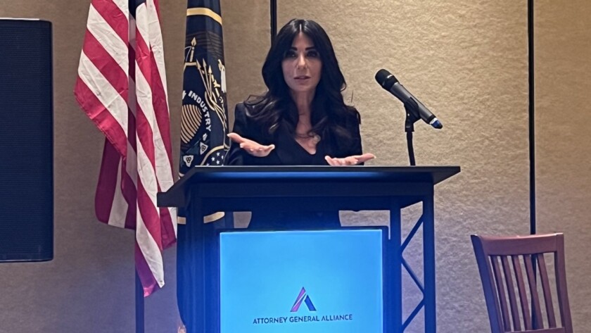 woman speaking at a podium