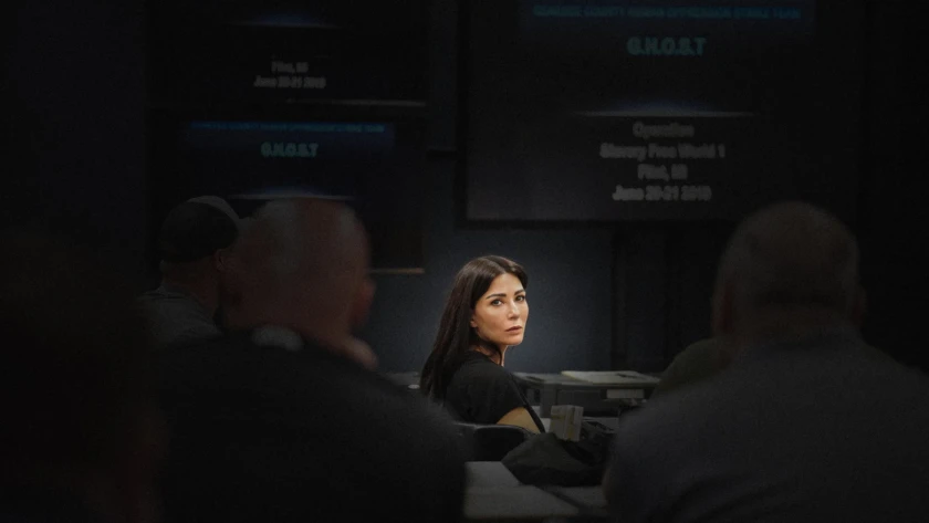 marisol nichols in a room coordinating with police officers