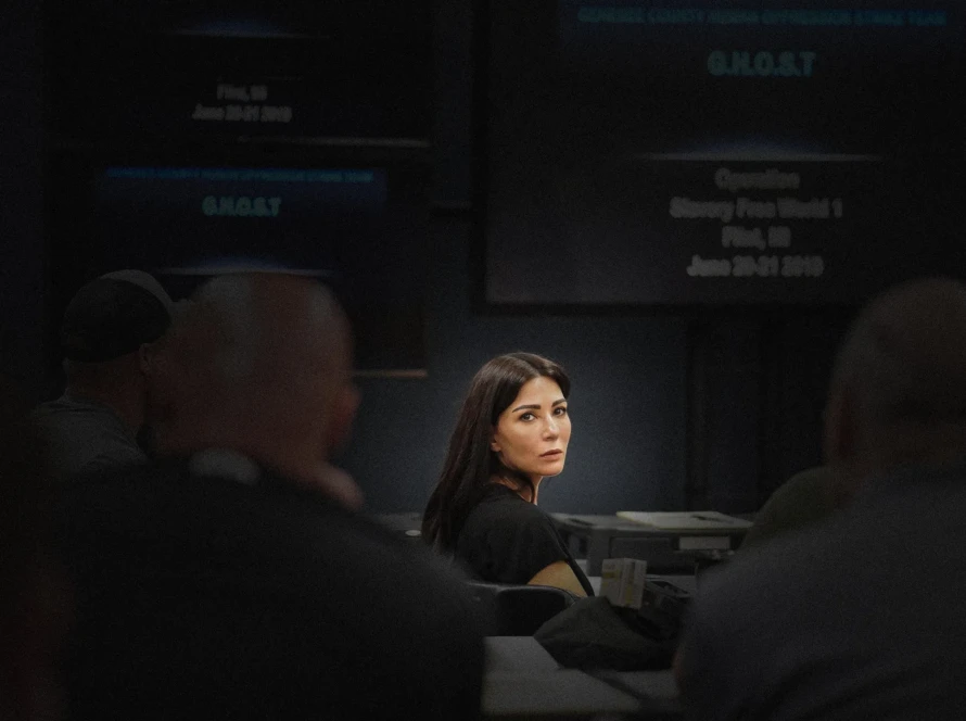 marisol nichols in a room coordinating with police officers